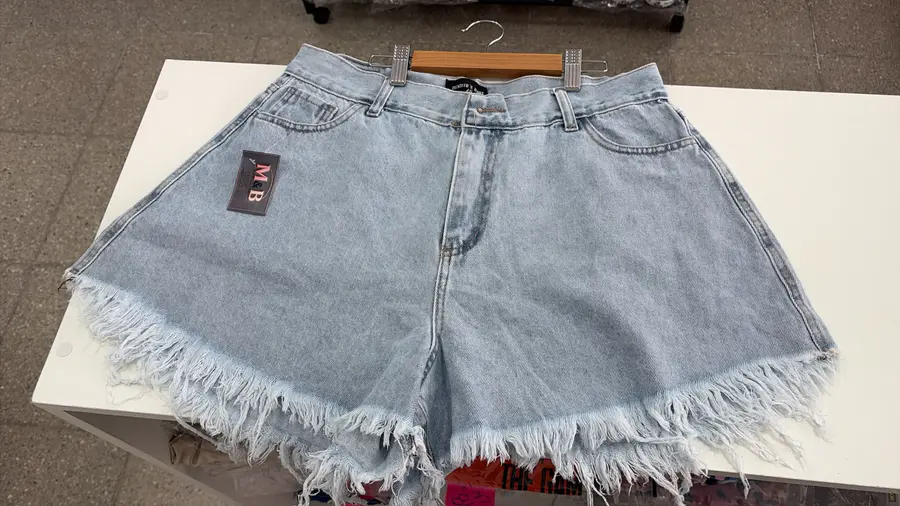 Short de jean mujer celeste con flecos